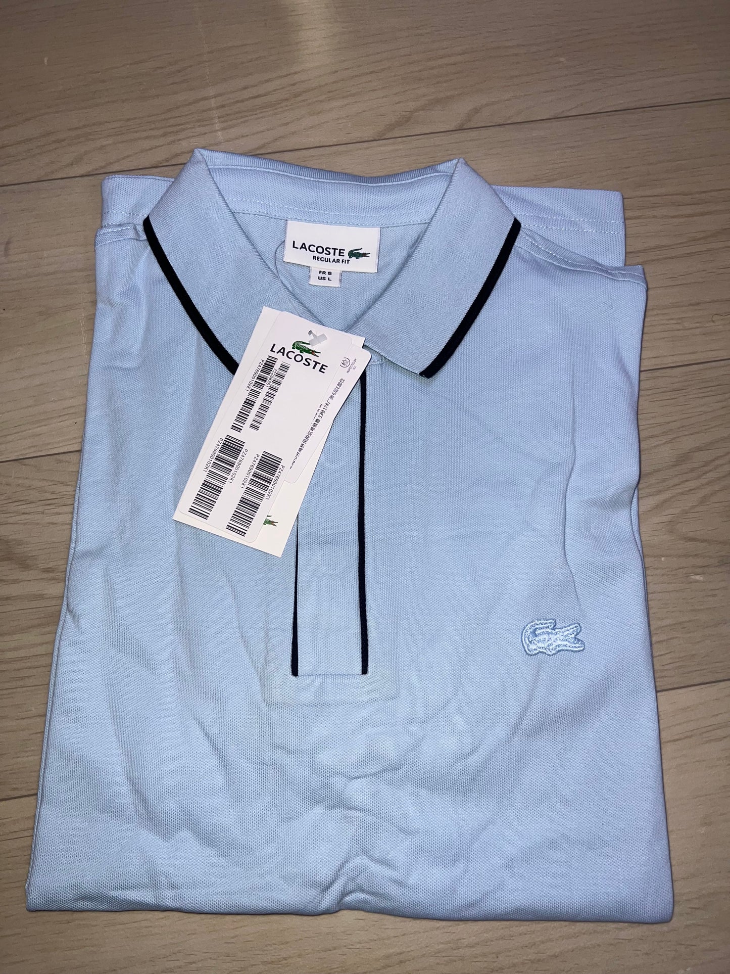 Polo Lacoste Bleu Ciel : Élégance Décontractée