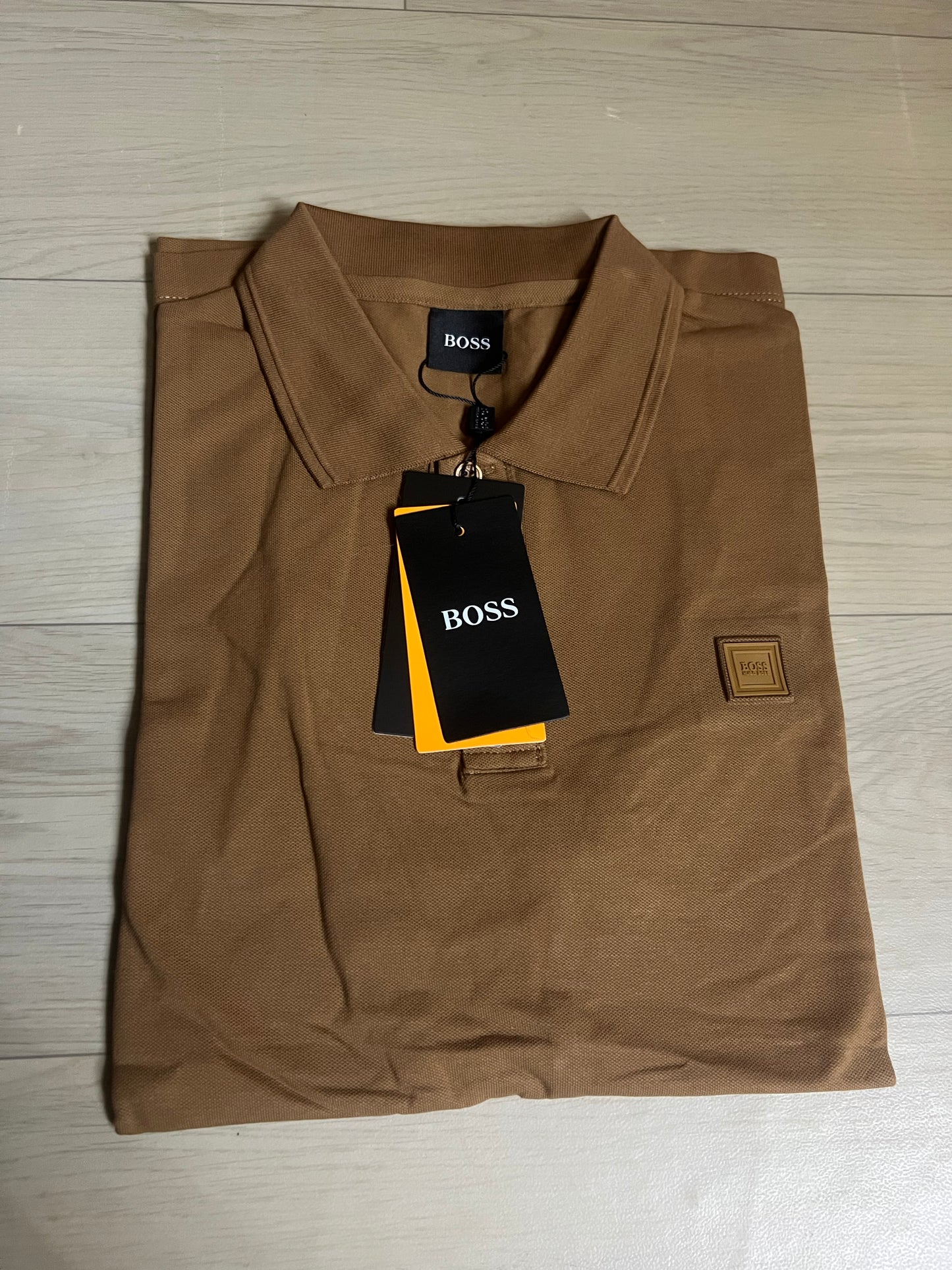 Polo Lacoste marron pour homme – élégance naturelle et confort premium